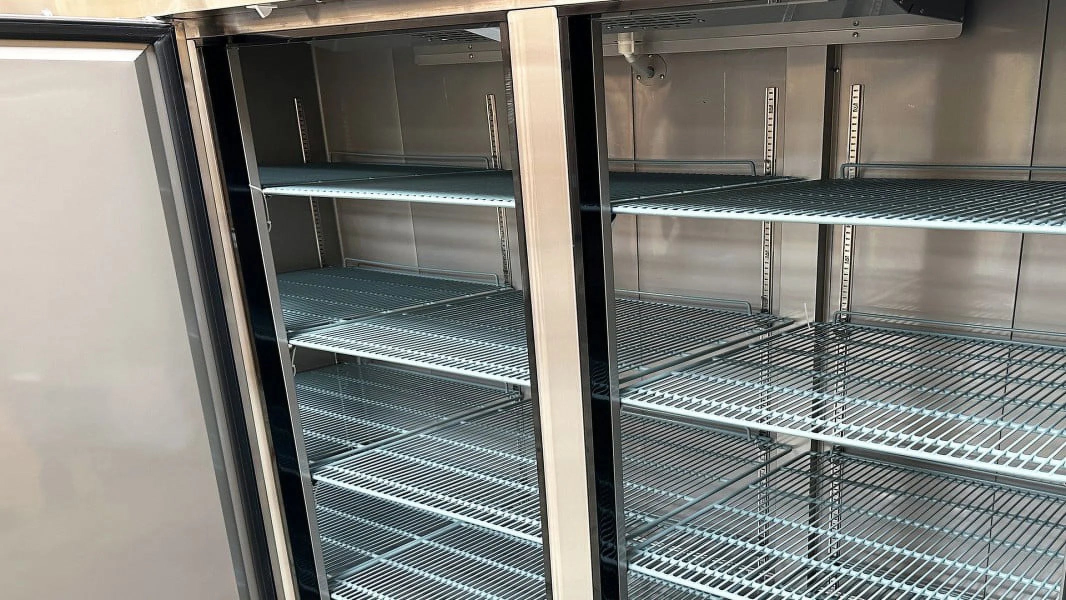 83 in. Three Door Upright Reach-in Commercial Freezer in Stainless Steel 64.80 Cu. ft.