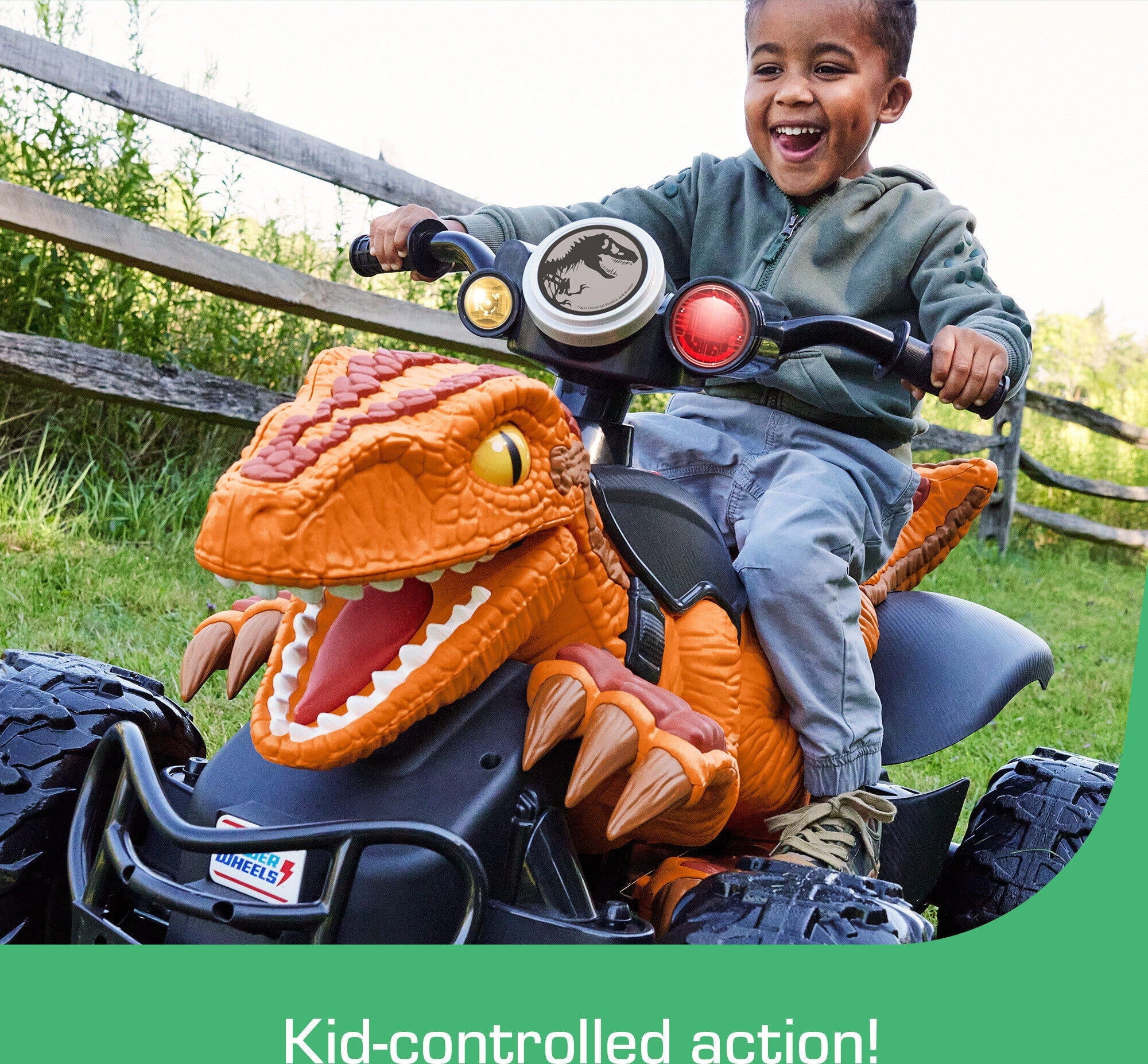 12V Power Wheels Jurassic World Dino Racer Battery-Powered Ride-On ATV Dinosaur Toy, Orange